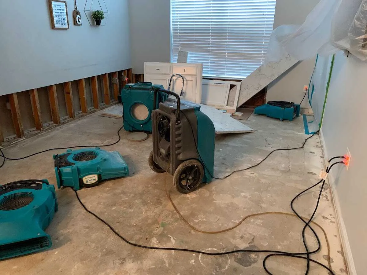 Dehumidifier in flood-cut room for Water Damage Restoration in Fairview